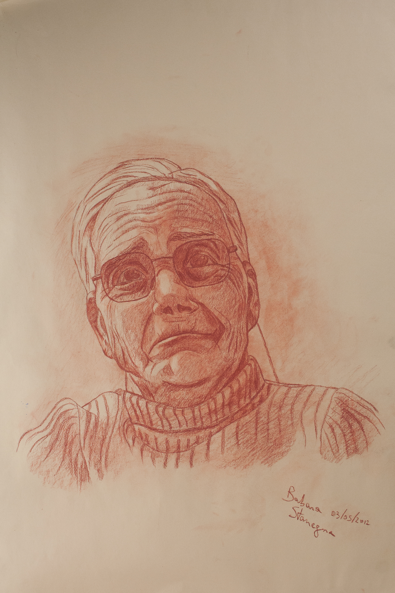 Sanguine drawing on paper representing a portrait of an old woman wearing glasses with sad expression