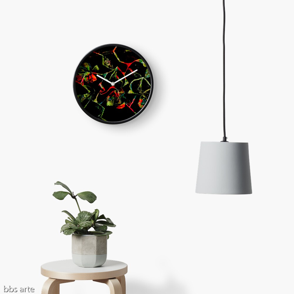 wall clock with abstract floral geometric red and green shapes on black