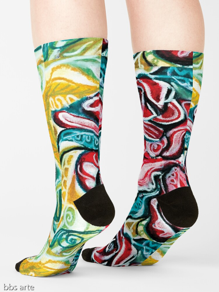 xmas design socks with Christmas colors abstract image in tones of red green, white, black and yellow