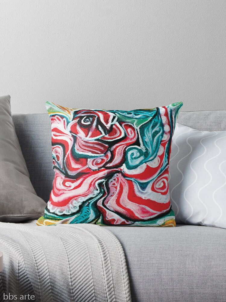 xmas design throw pillow with Christmas colors abstract image in tones of red green, white, black and yellow