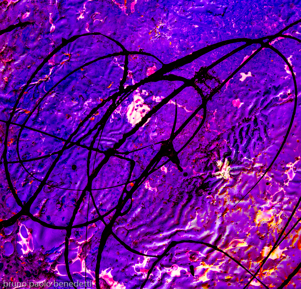 concentric lines on wavy purple background with shades of fuchsia, spots and white streaks