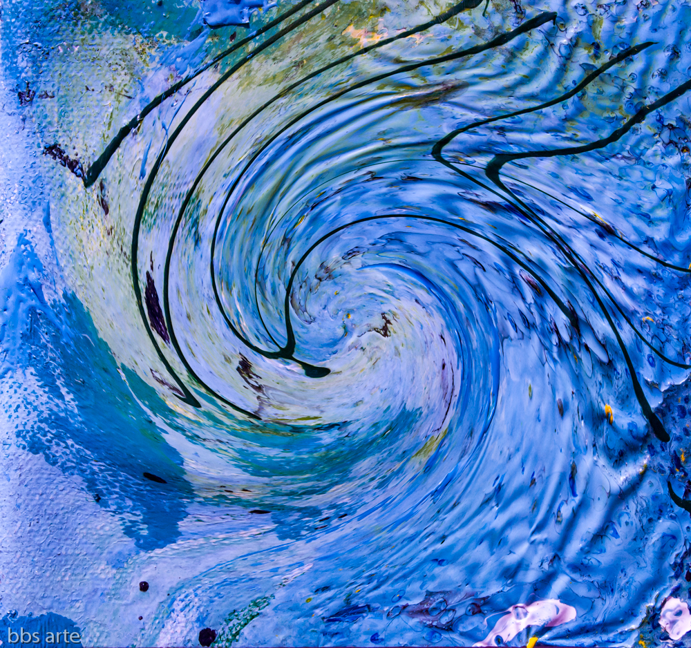 fluid vortex in indigo color with black bent lines,waves and green shades